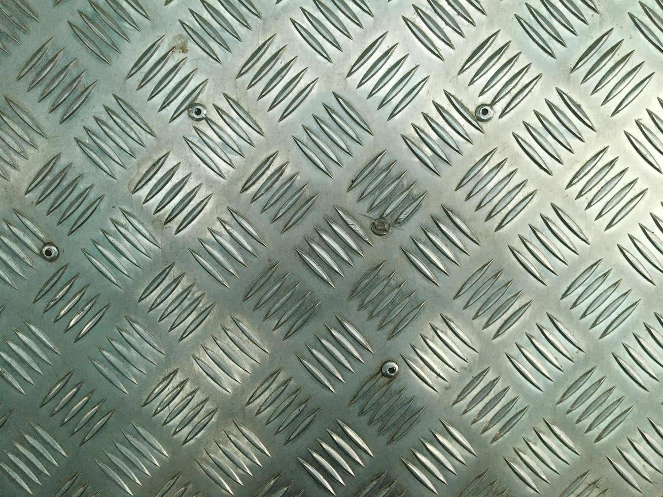 plaque de diamant en acier, fond de texture de sol en fer de l'industrie. photo