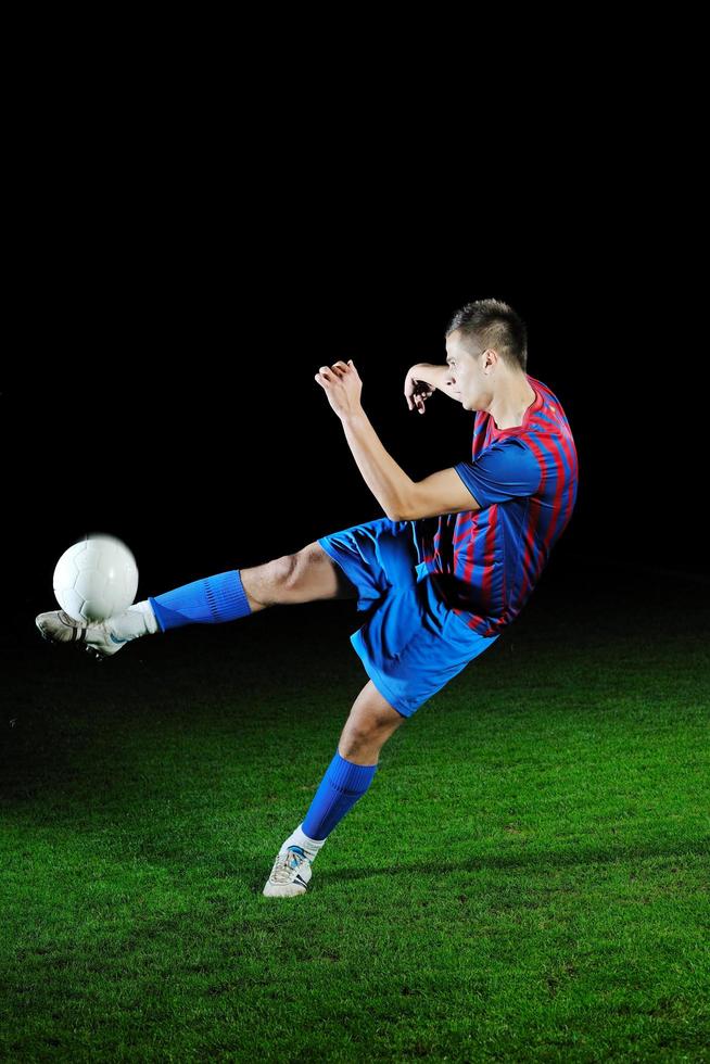 joueur de football en action photo