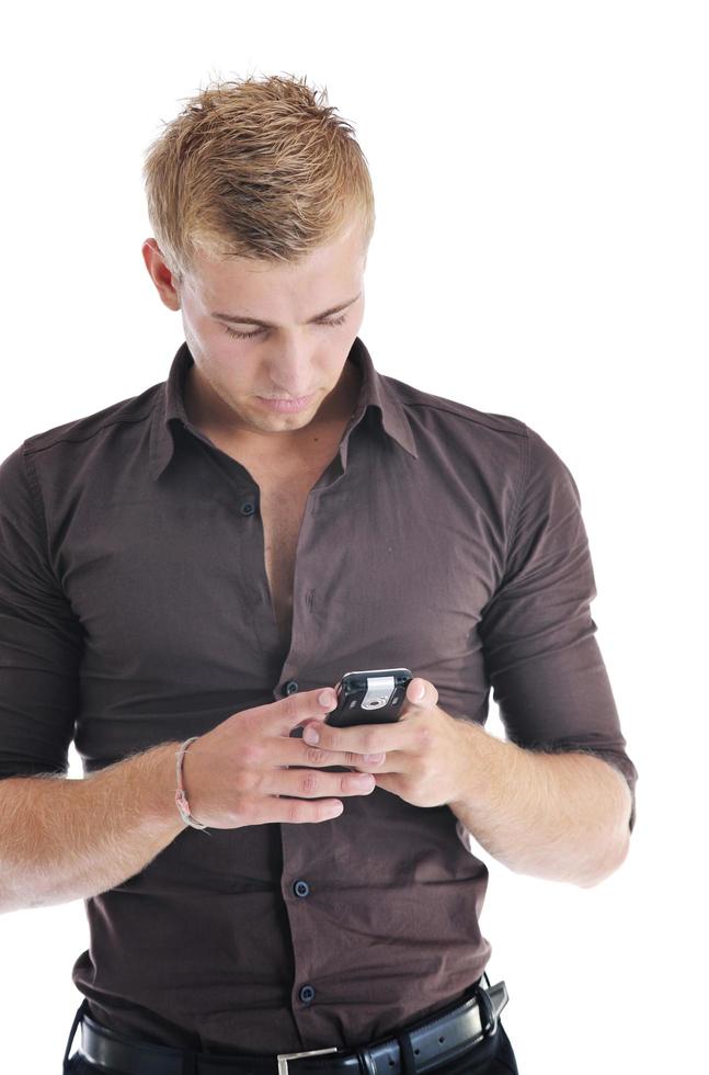 un homme d'affaires avec téléphone portable isolé sur blanc photo