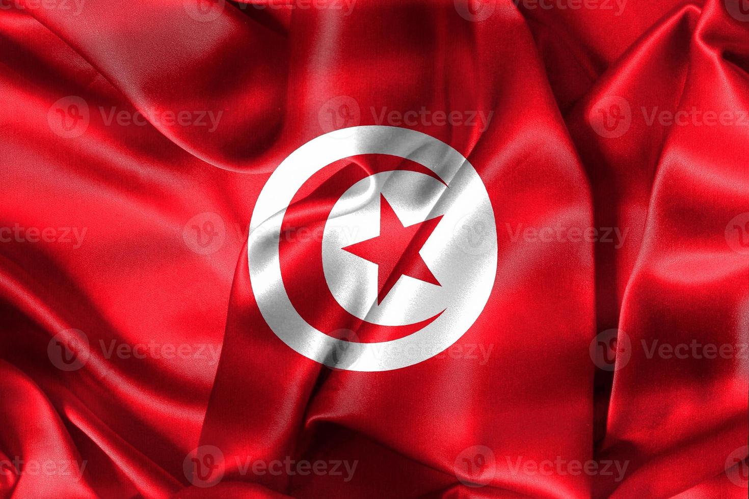 Illustration 3d d'un drapeau tunisien - drapeau en tissu ondulant réaliste photo