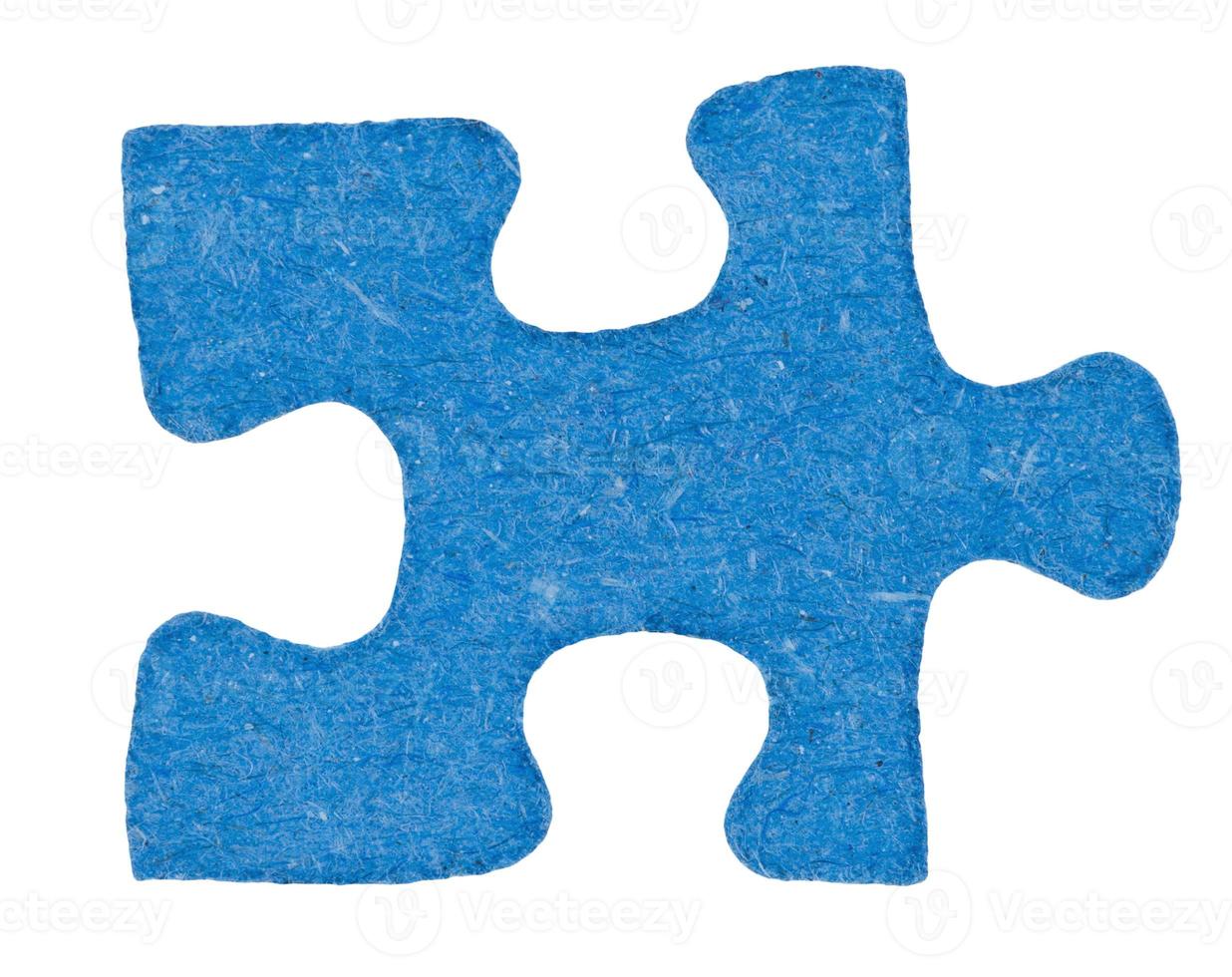 un morceau de puzzle bleu en carton photo