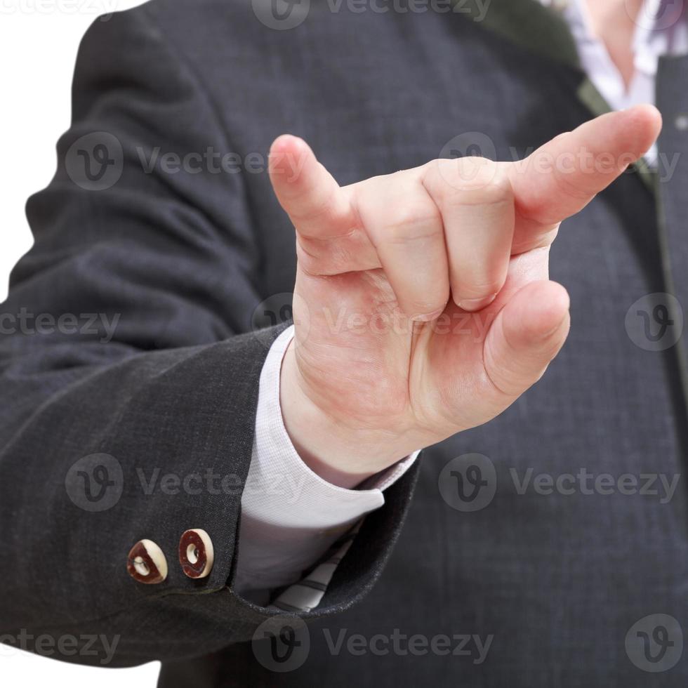 homme d'affaires montre cornes doigts signe gros plan photo