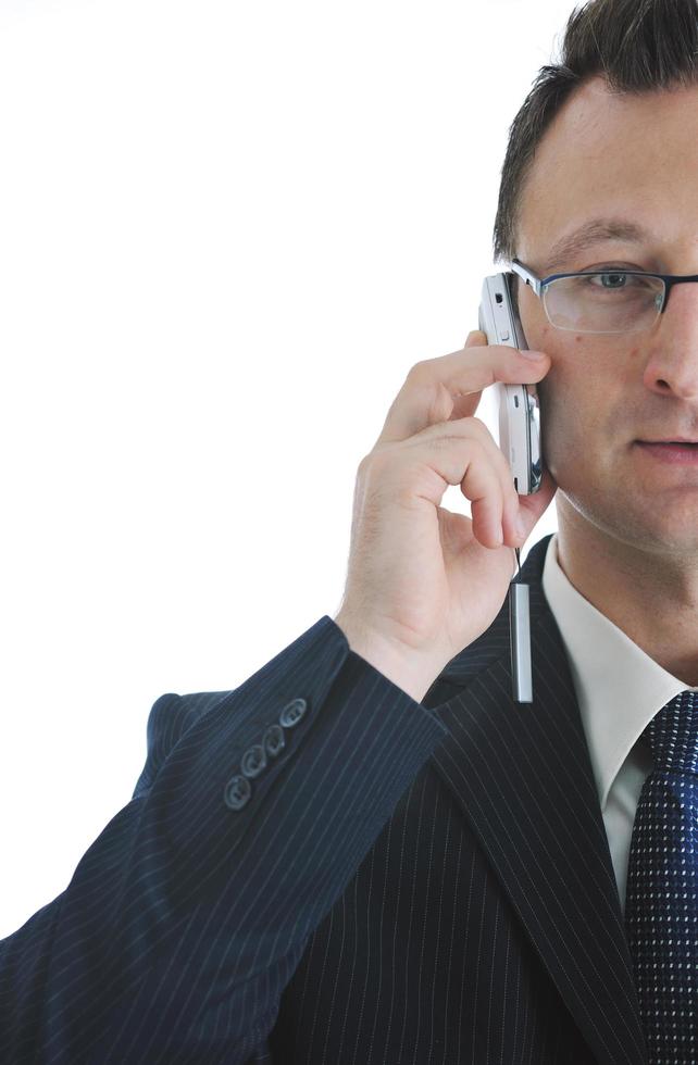 homme d'affaires avec téléphone portable isolé sur blanc photo