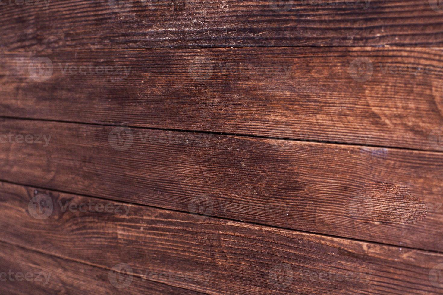 texture de fond en bois de couleur vintage avec noeuds et trous de clous. vieux mur en bois peint. planches horizontales sombres en bois. vue de face avec espace de copie. photo