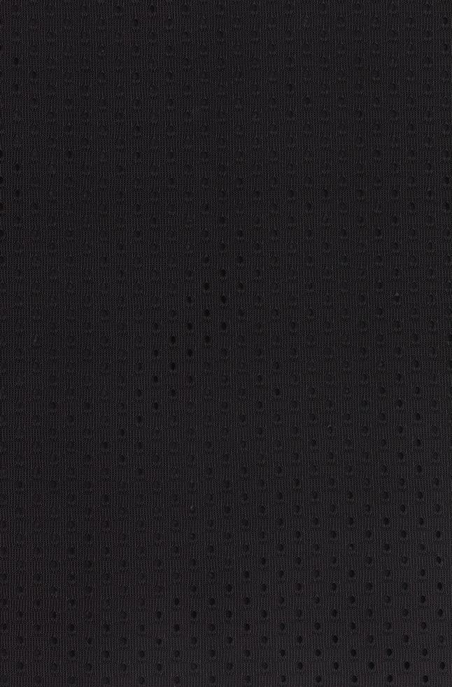 motif de fond textile en tissu de vêtements de sport en maille noire photo