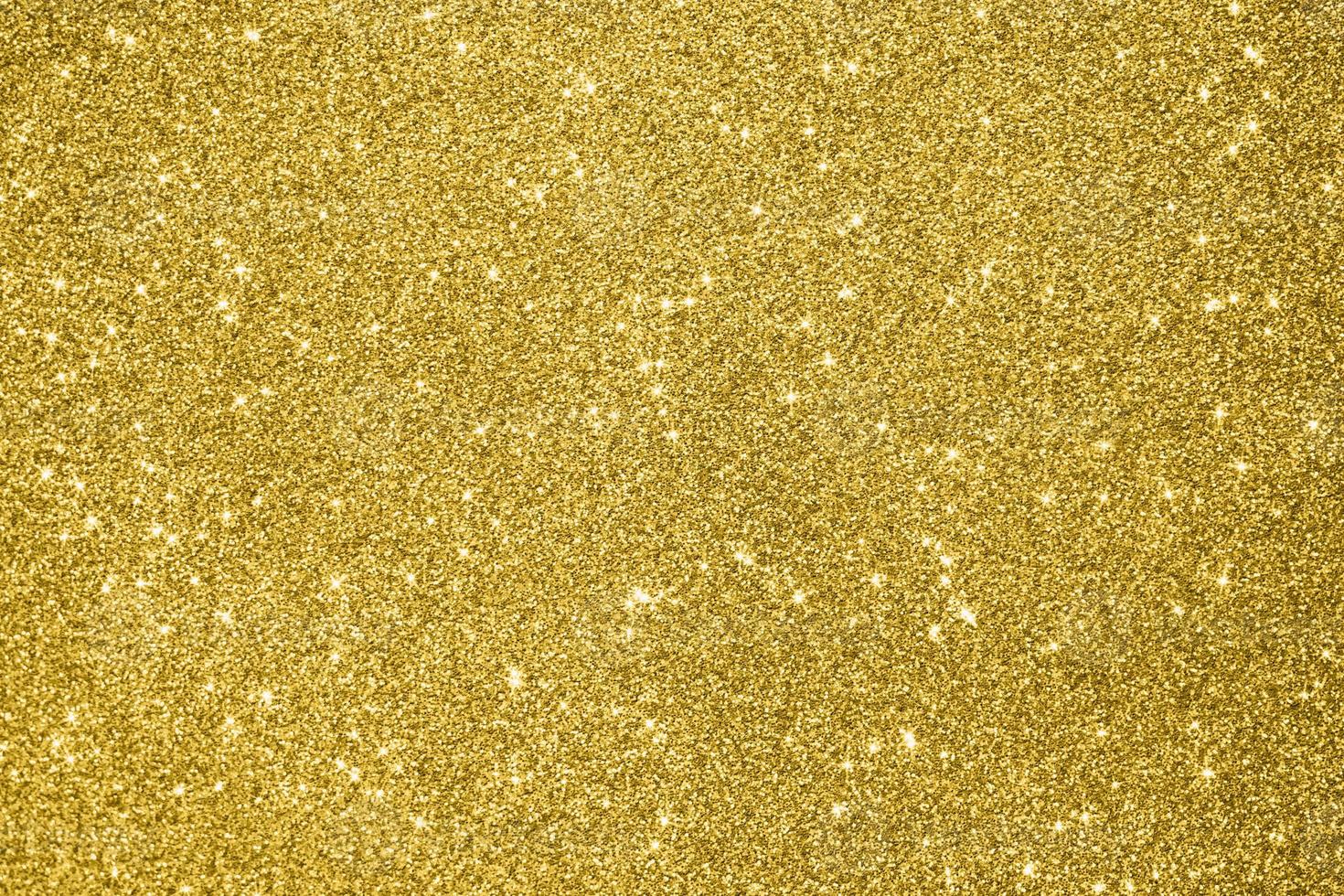 fond abstrait paillettes d'or scintillant photo