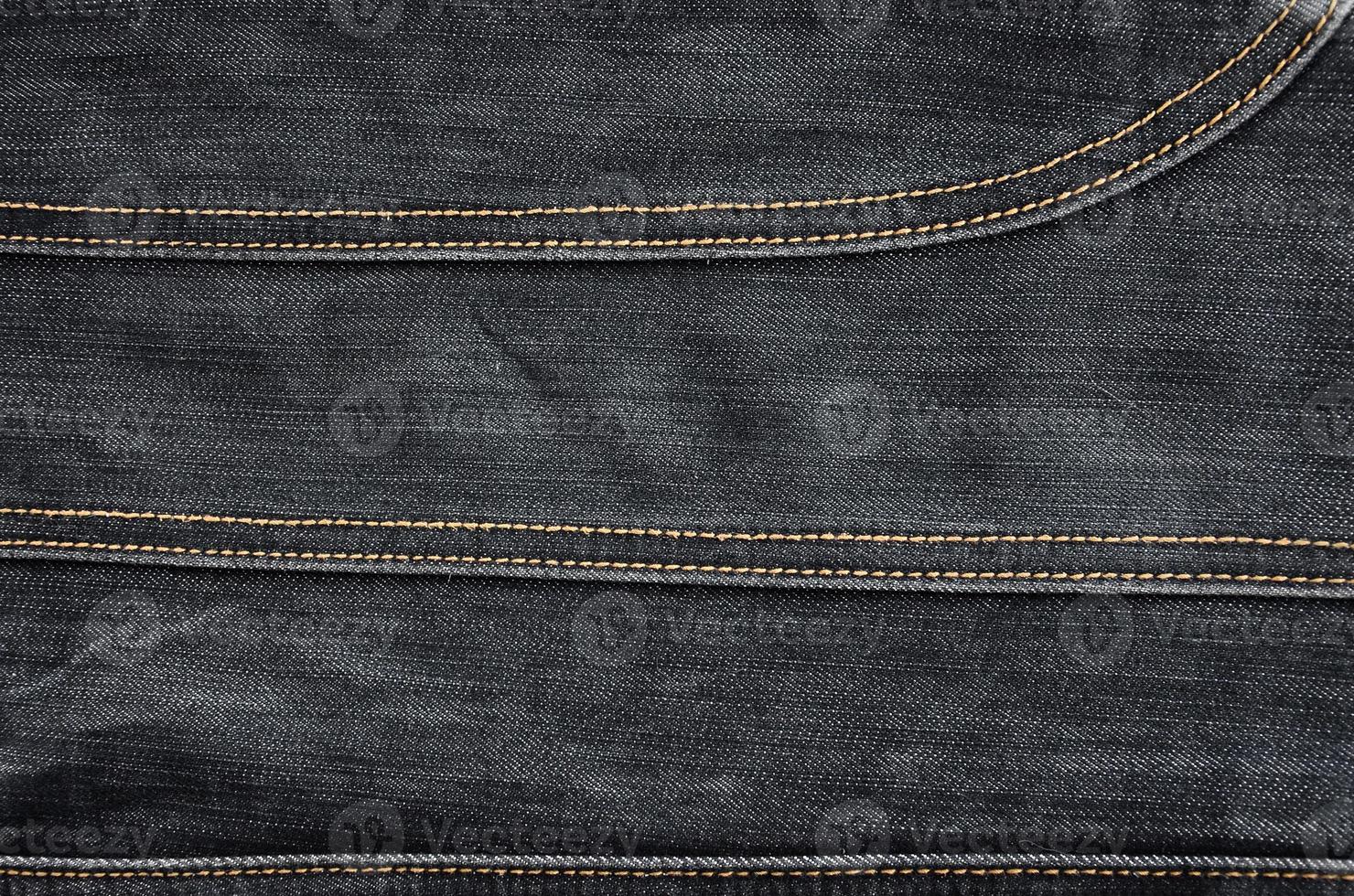 la texture du tissu denim noir photo