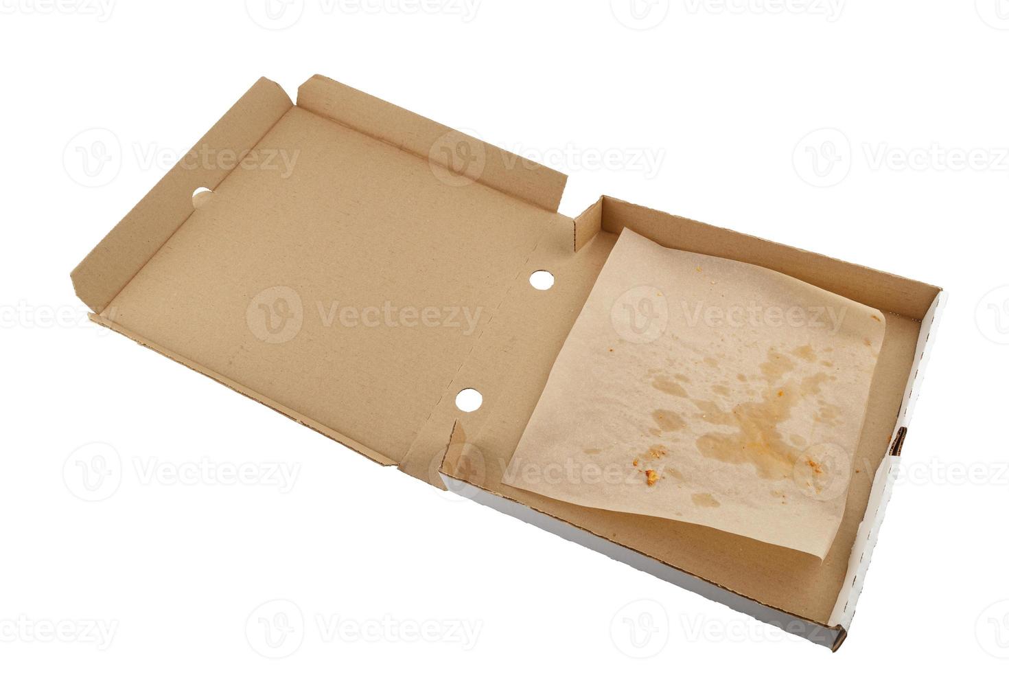 Boîte à pizza vide mangé ouvert isolé sur fond blanc photo