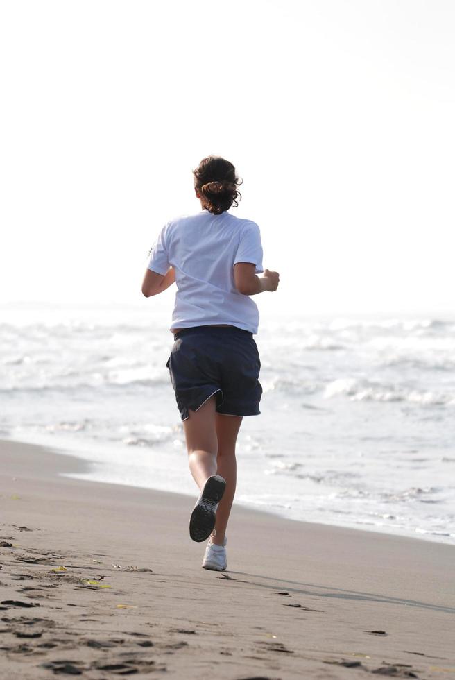 coureur sur la plage photo