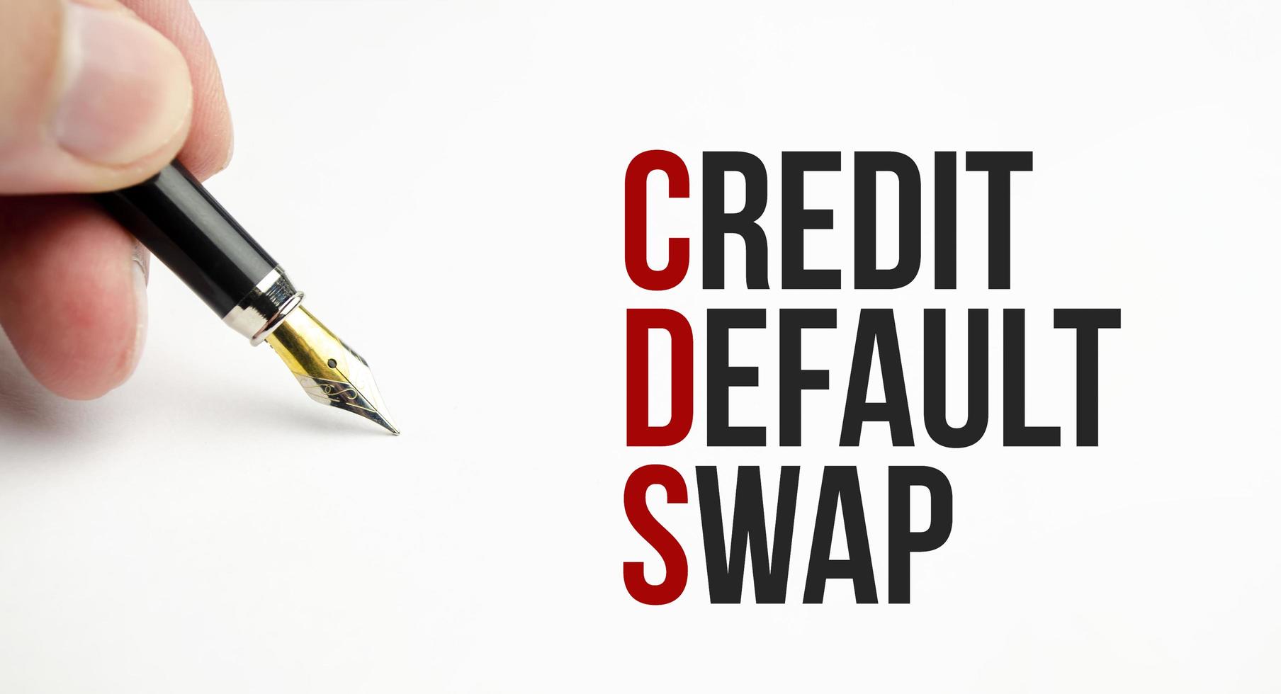 cds credit default swap - mot sur un cahier blanc sur le fond photo