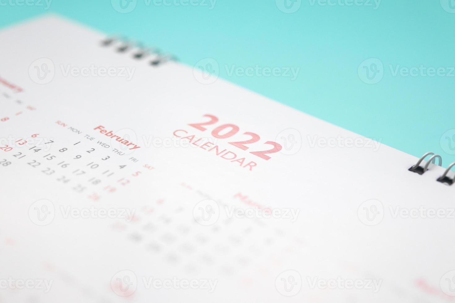 Page de calendrier 2022 sur fond bleu concept de réunion de rendez-vous de planification d'entreprise photo