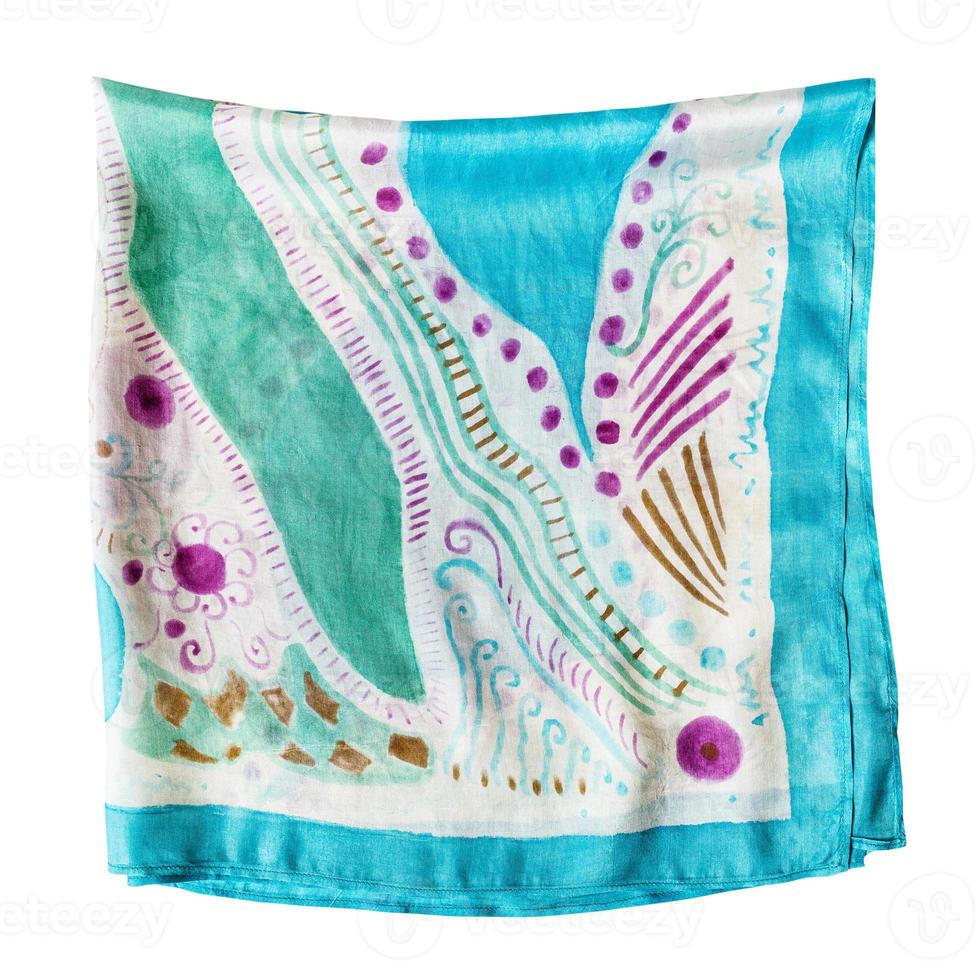 foulard en soie multicolore plié isolé photo