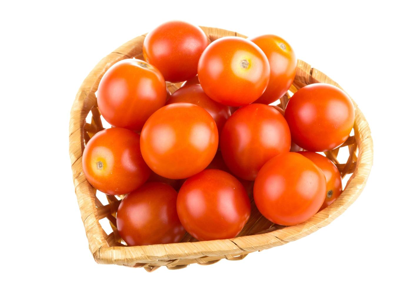 tomates cerises sur blanc photo