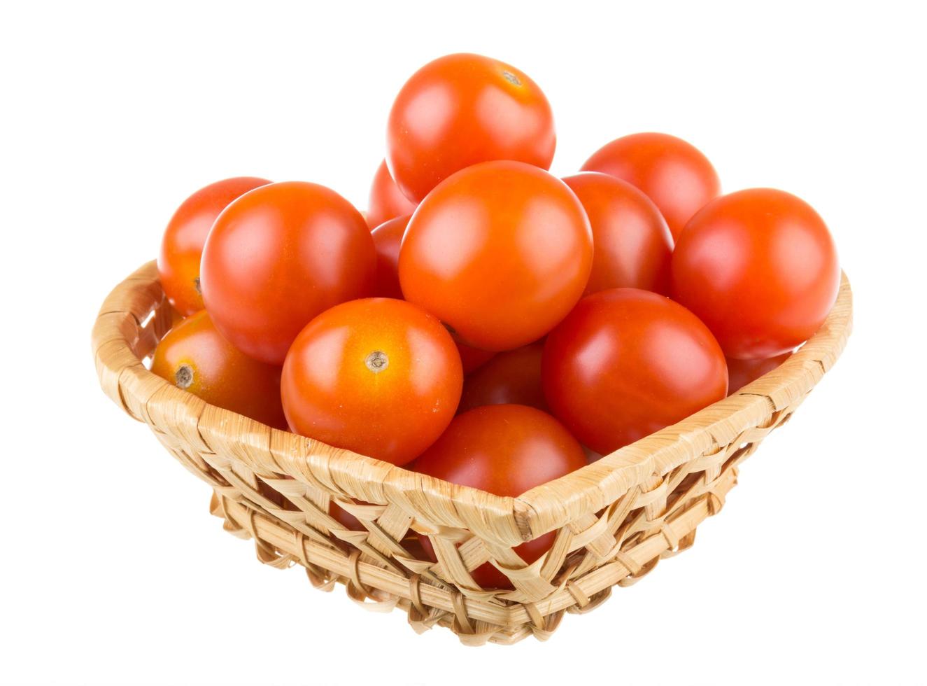tomates cerises sur blanc photo