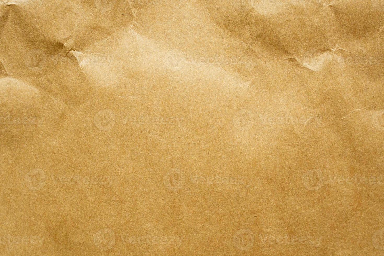 fond de texture de feuille kraft recyclée en papier froissé brun photo