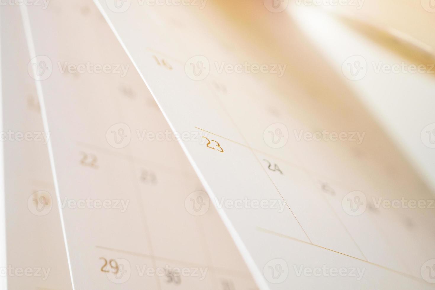 feuille de feuille de retournement de page de calendrier gros plan arrière-plan flou calendrier d'affaires planification rendez-vous concept de réunion photo