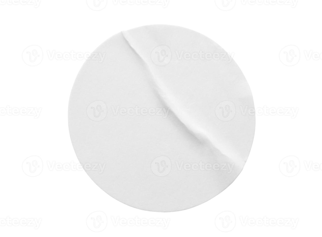 Étiquette autocollante en papier rond blanc vierge isolée sur fond blanc photo