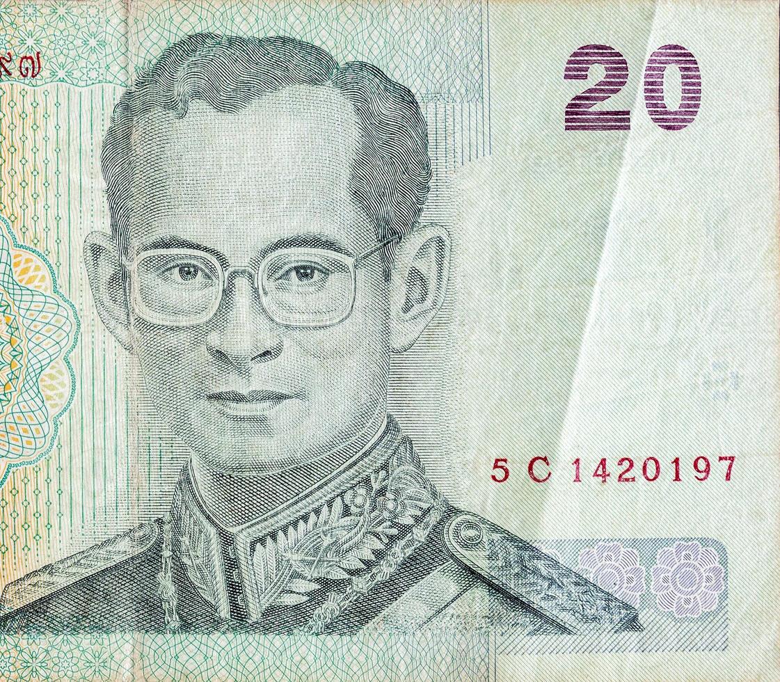 roi bhumibol adulyadej sur 20 baht thailand money bill close up photo