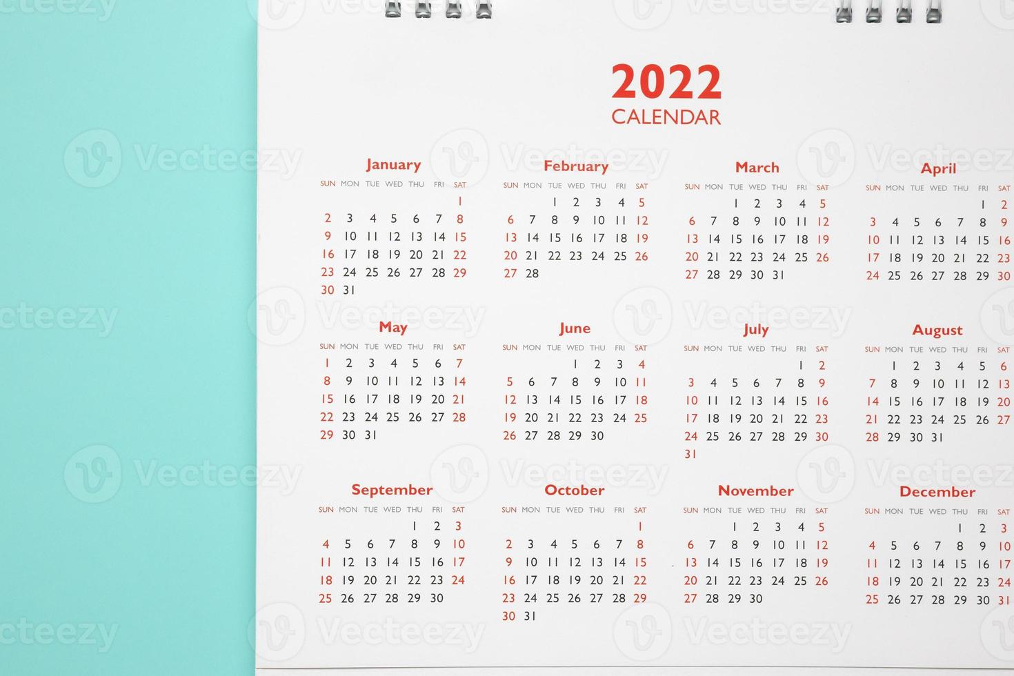 Page de calendrier 2022 sur fond bleu concept de réunion de rendez-vous de planification d'entreprise photo