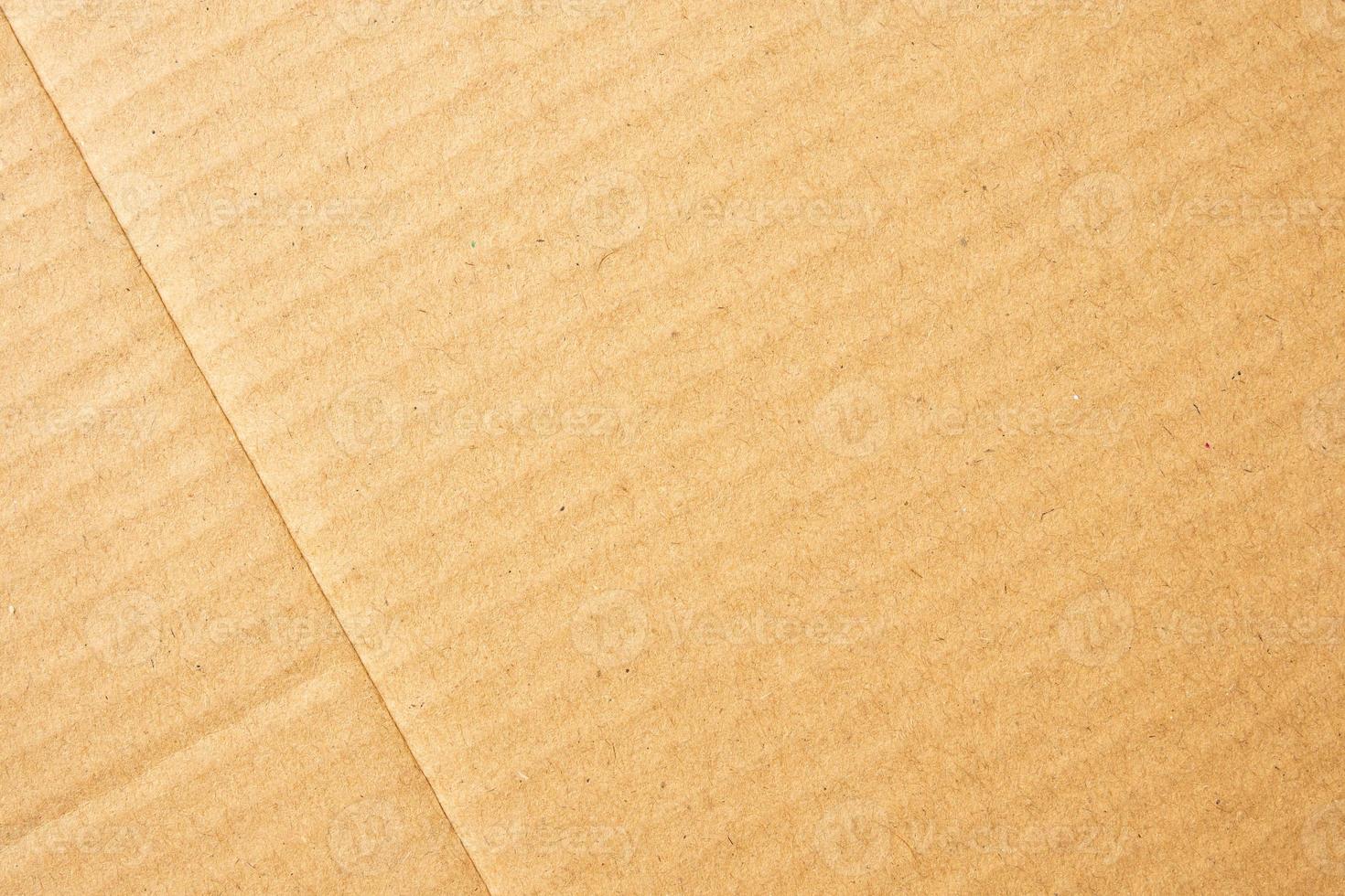 Vieux fond de texture de papier de boîte en carton brun photo