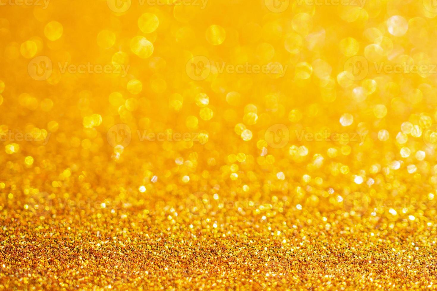 paillettes d'or scintillent avec fond bokeh photo