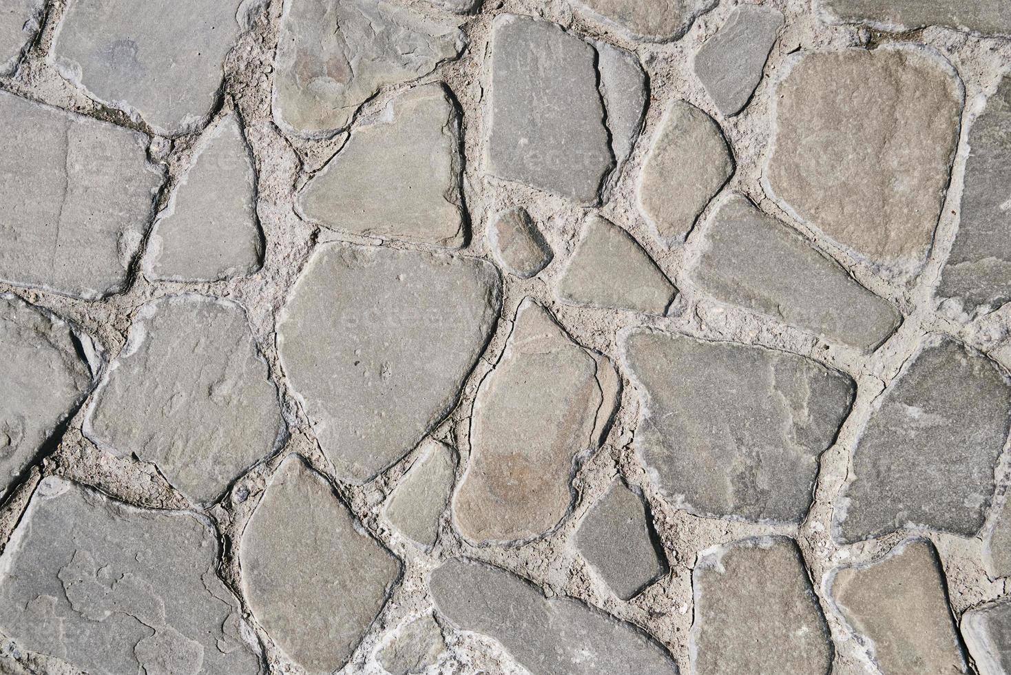 texture de pierre de vieux mur. fond abstrait avec des briques photo