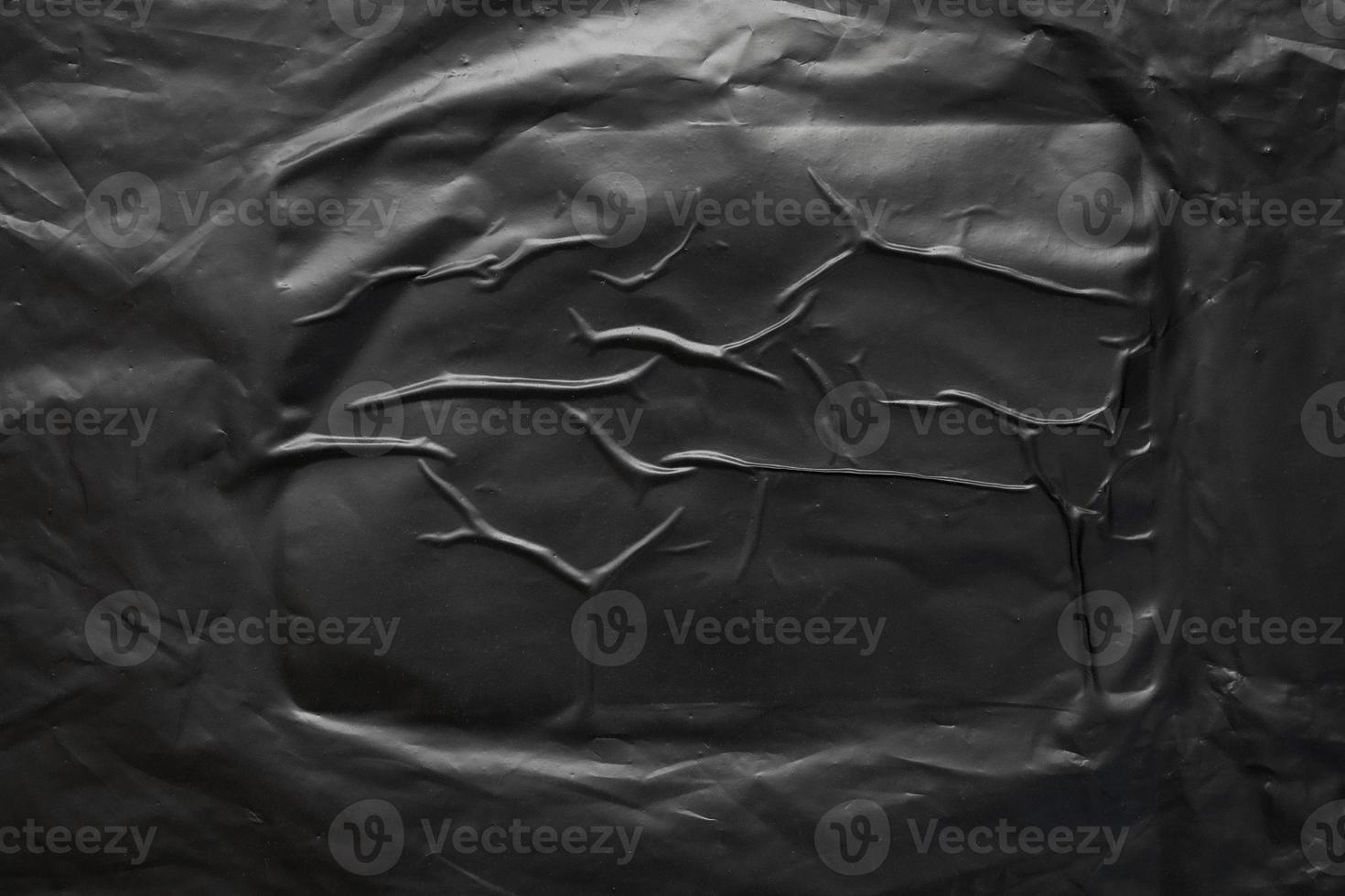 texture de superposition d'enveloppe de sac en plastique transparent sur fond noir photo