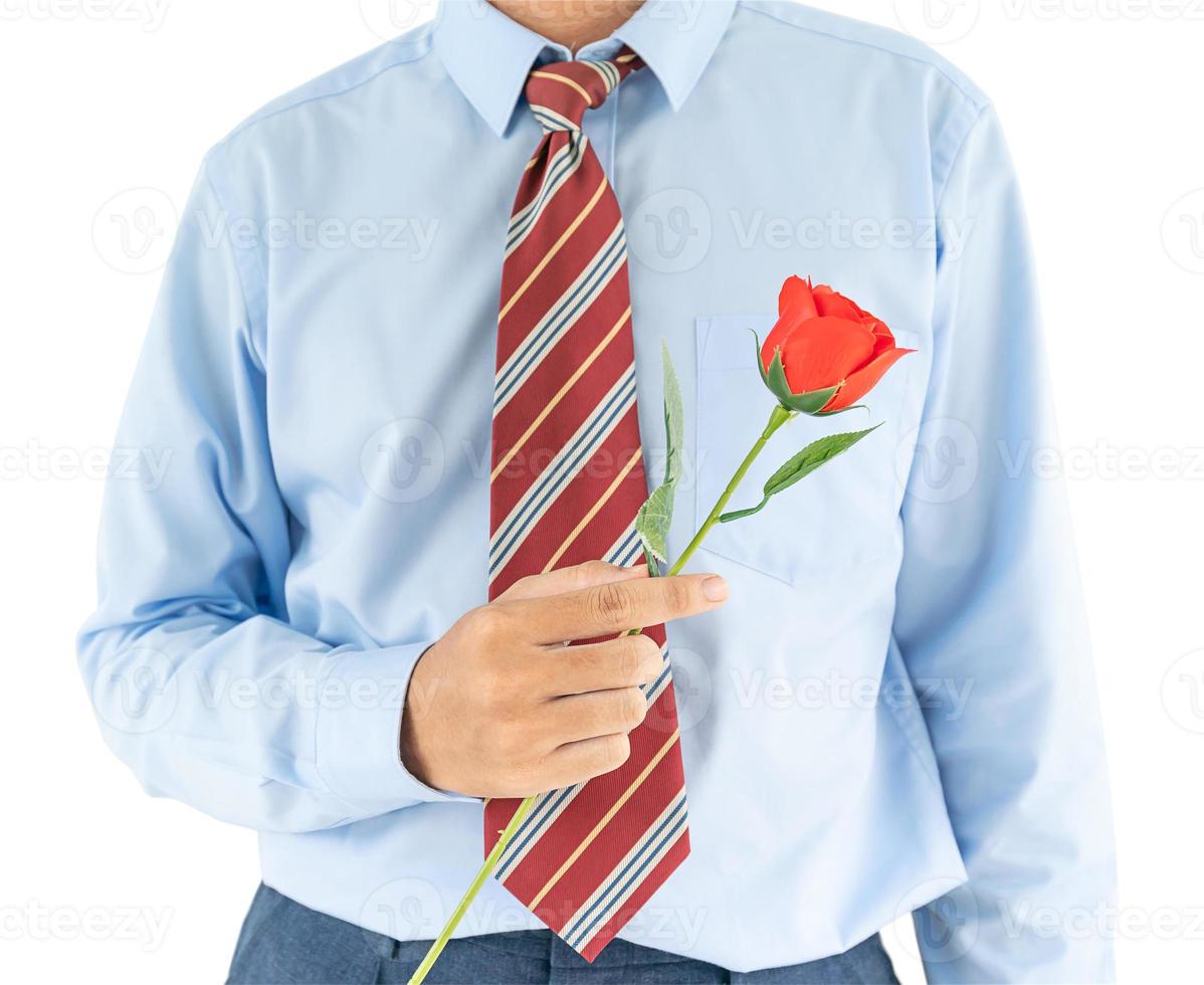 homme tenant avec une rose rouge sur fond blanc photo