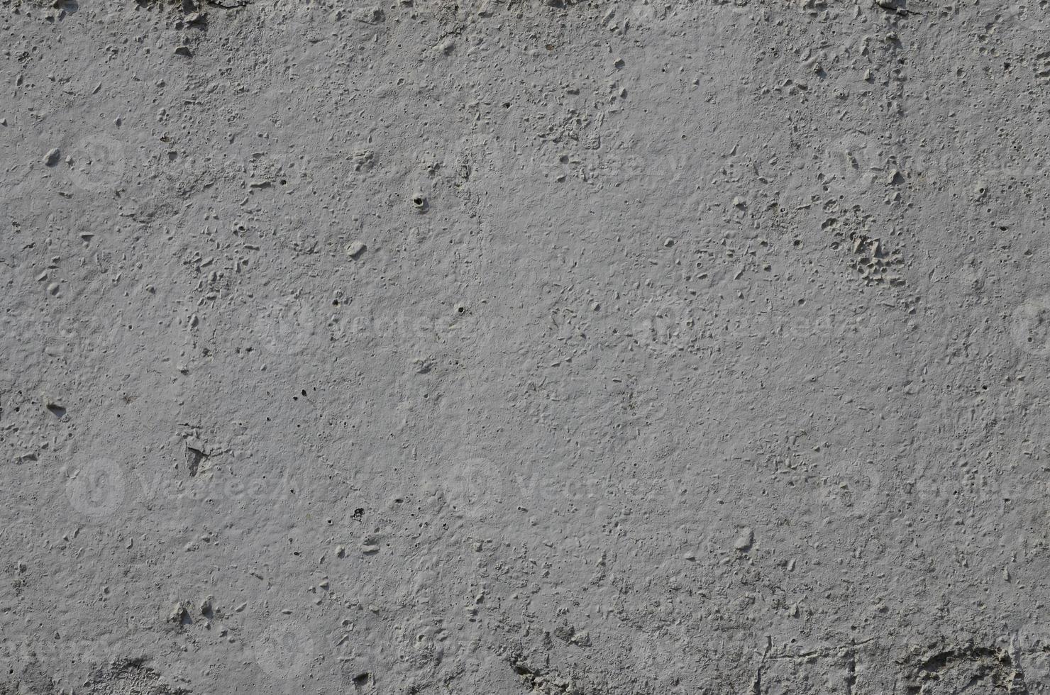 texture de l'ancien mur de béton gaufré de couleur grise. image de fond d'un produit en béton photo
