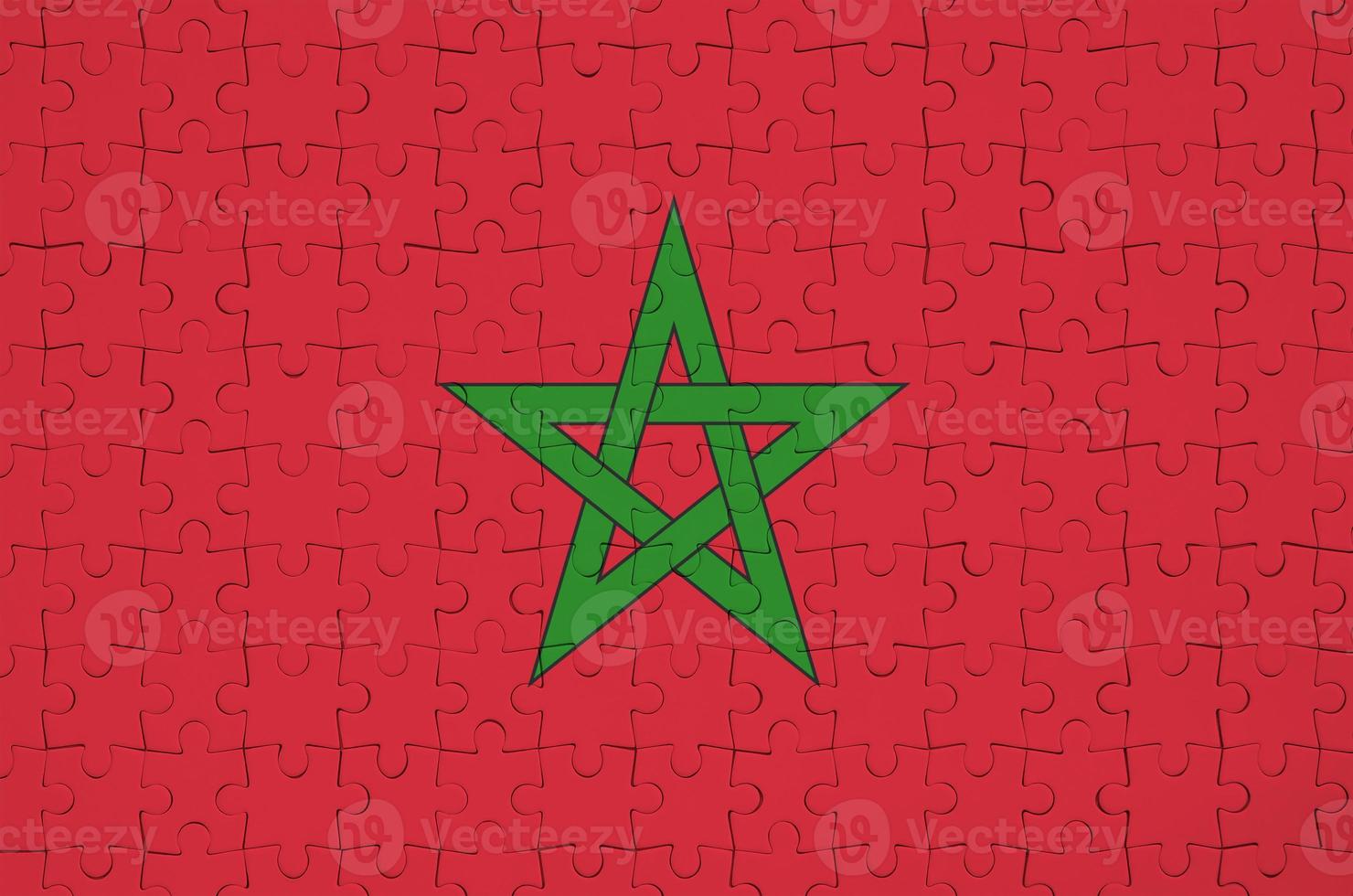 le drapeau marocain est représenté sur un puzzle plié photo