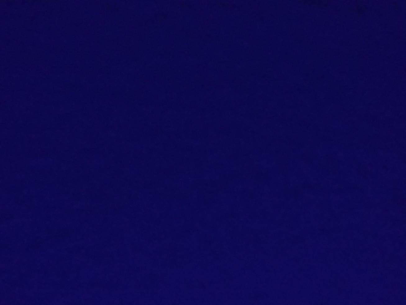 abstraction bleu foncé dans l'obscurité utilisée pour concevoir des arrière-plans et des fonds d'écran. photo