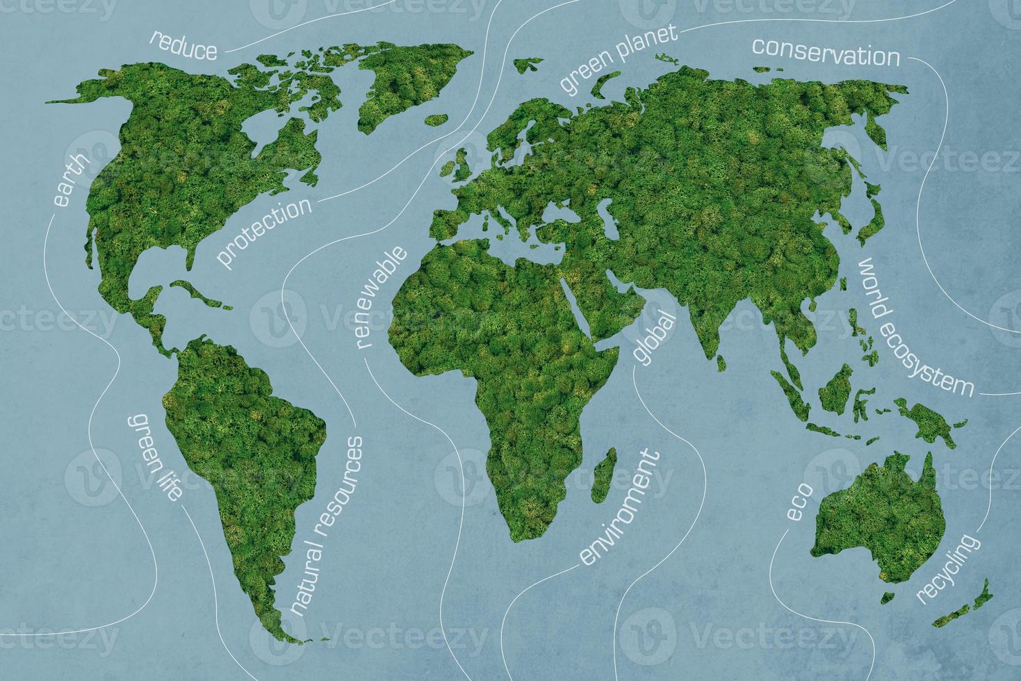 monde vert. image en gros plan de la carte du monde texturée de mousse sur fond bleu photo