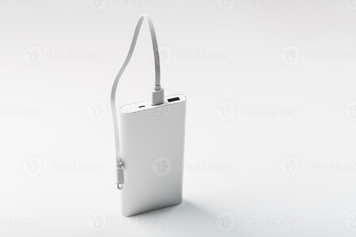 banque d'alimentation pour charger votre smartphone sur fond blanc. batterie externe universelle pour espace libre de gadgets et composition minimaliste. photo