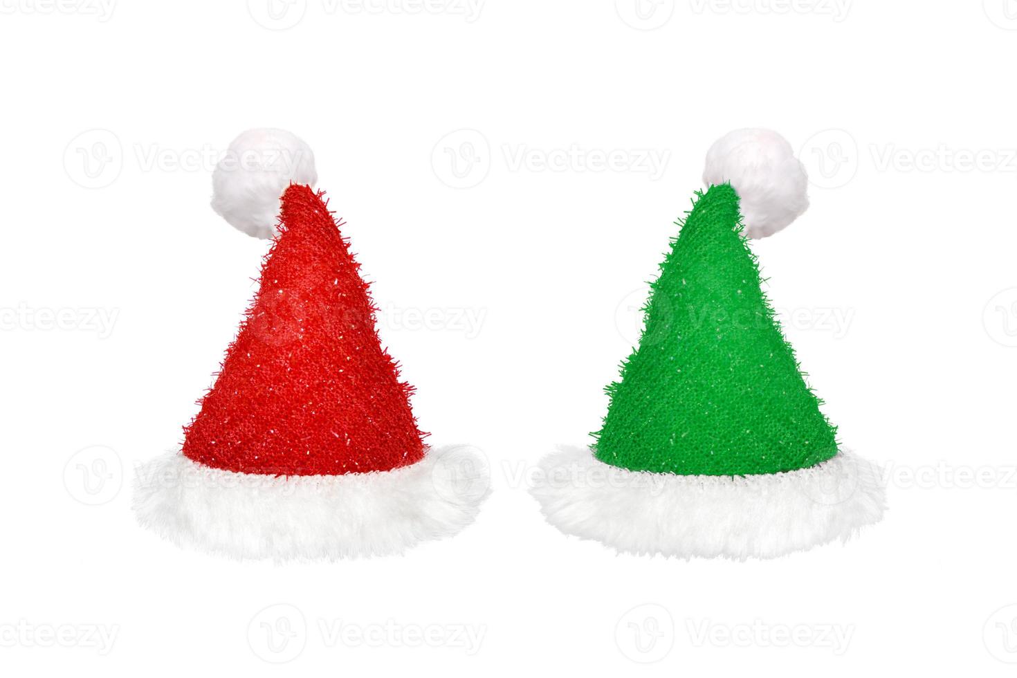 Chapeau rouge et vert santa claus christmas hat isolé sur fond blanc photo
