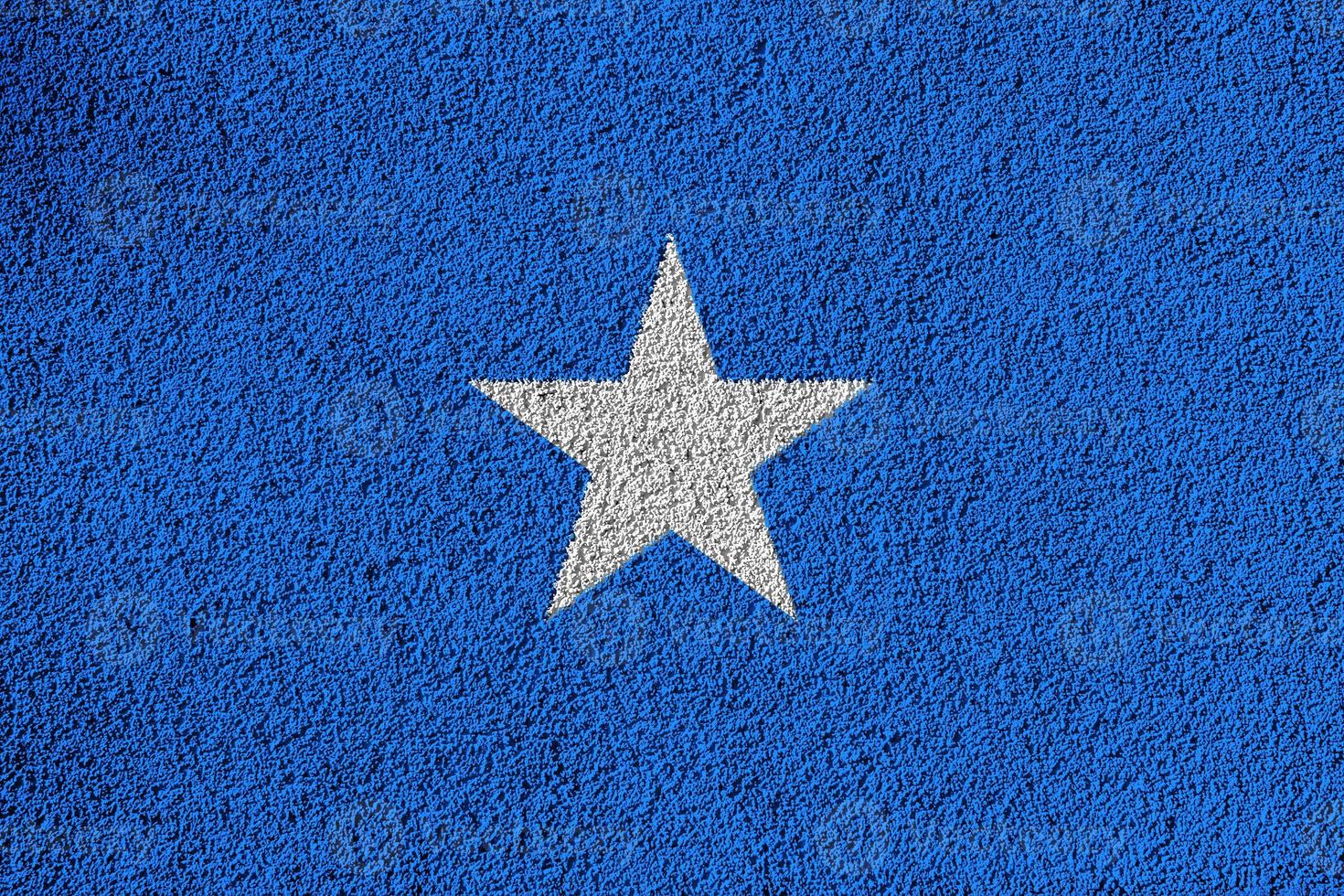 drapeau de la somalie fond texturé. collage conceptuel. photo
