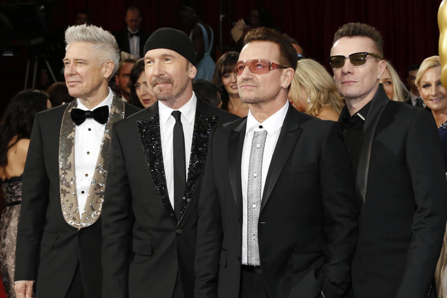 los angeles, 2 mars - le bord, adam clayton, bono, larry mullen jr à la 86e cérémonie des académies au dolby theatre, hollywood et highland le 2 mars 2014 à los angeles, ca photo