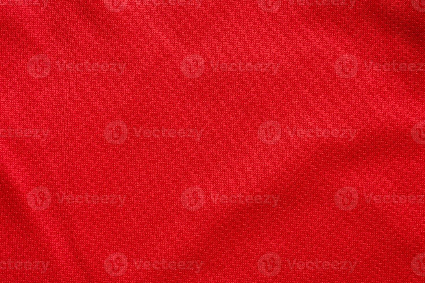 fond de texture de maillot de football de tissu de vêtements de sport rouge photo