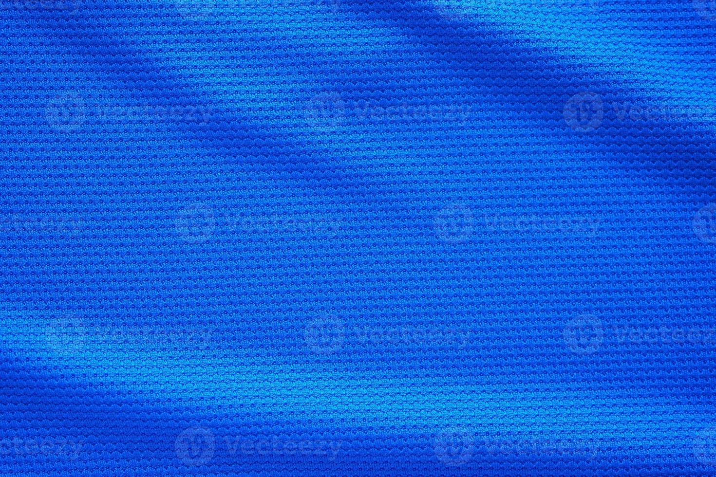 maillot de football bleu vêtements texture tissu vêtements de sport arrière-plan, vue de dessus en gros plan photo