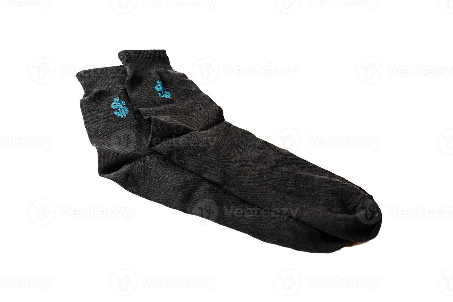 Chaussettes noires pour hommes avec signe dollar sur fond blanc photo