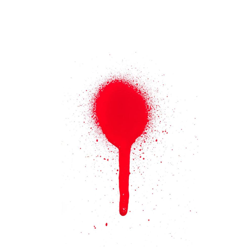 Texture de peinture en aérosol rouge vif sur fond blanc photo