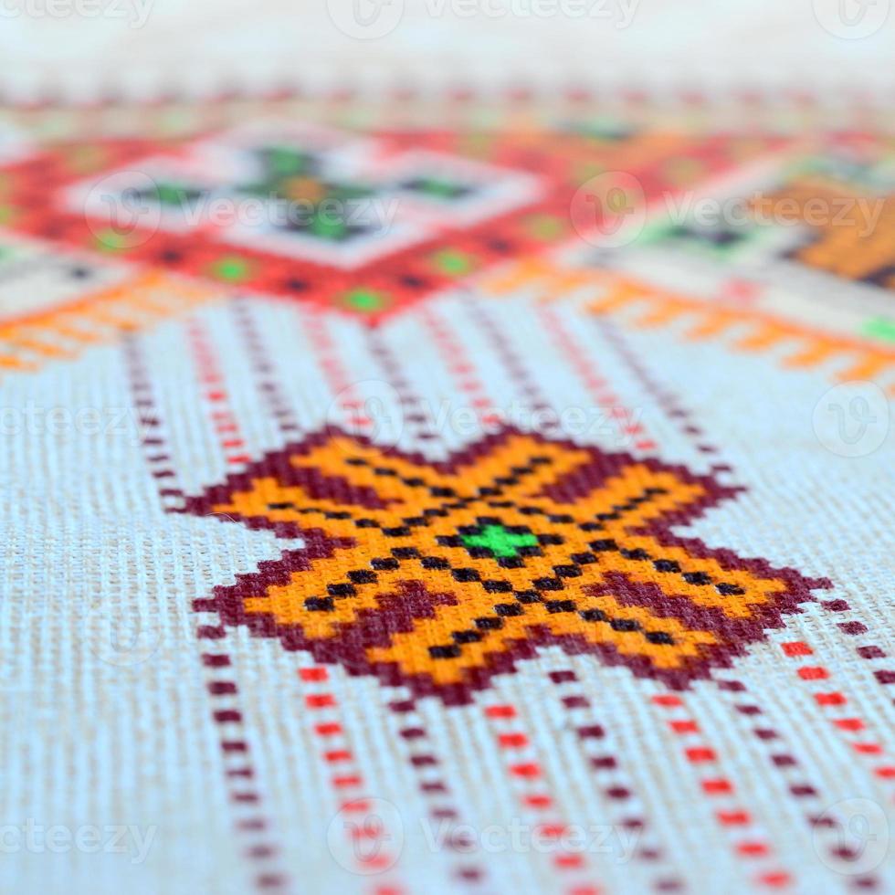 motif de broderie tricoté d'art populaire ukrainien traditionnel sur tissu textile photo