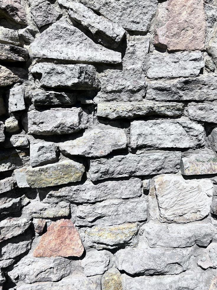 fond de pierres. un mur en pierre photo