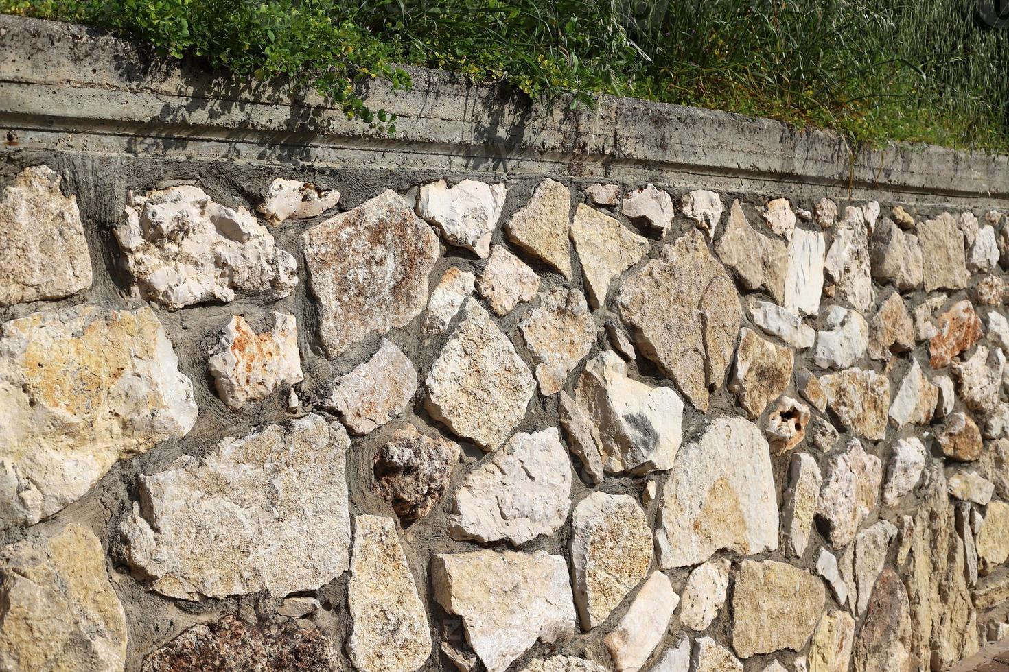 haut mur en pierre et béton. photo