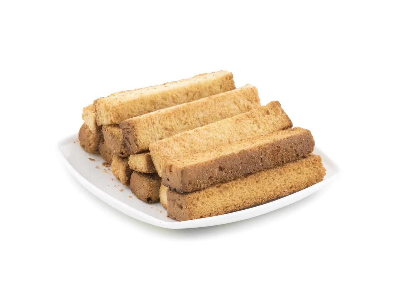 bâtonnets de pain grillé sur une assiette blanche photo
