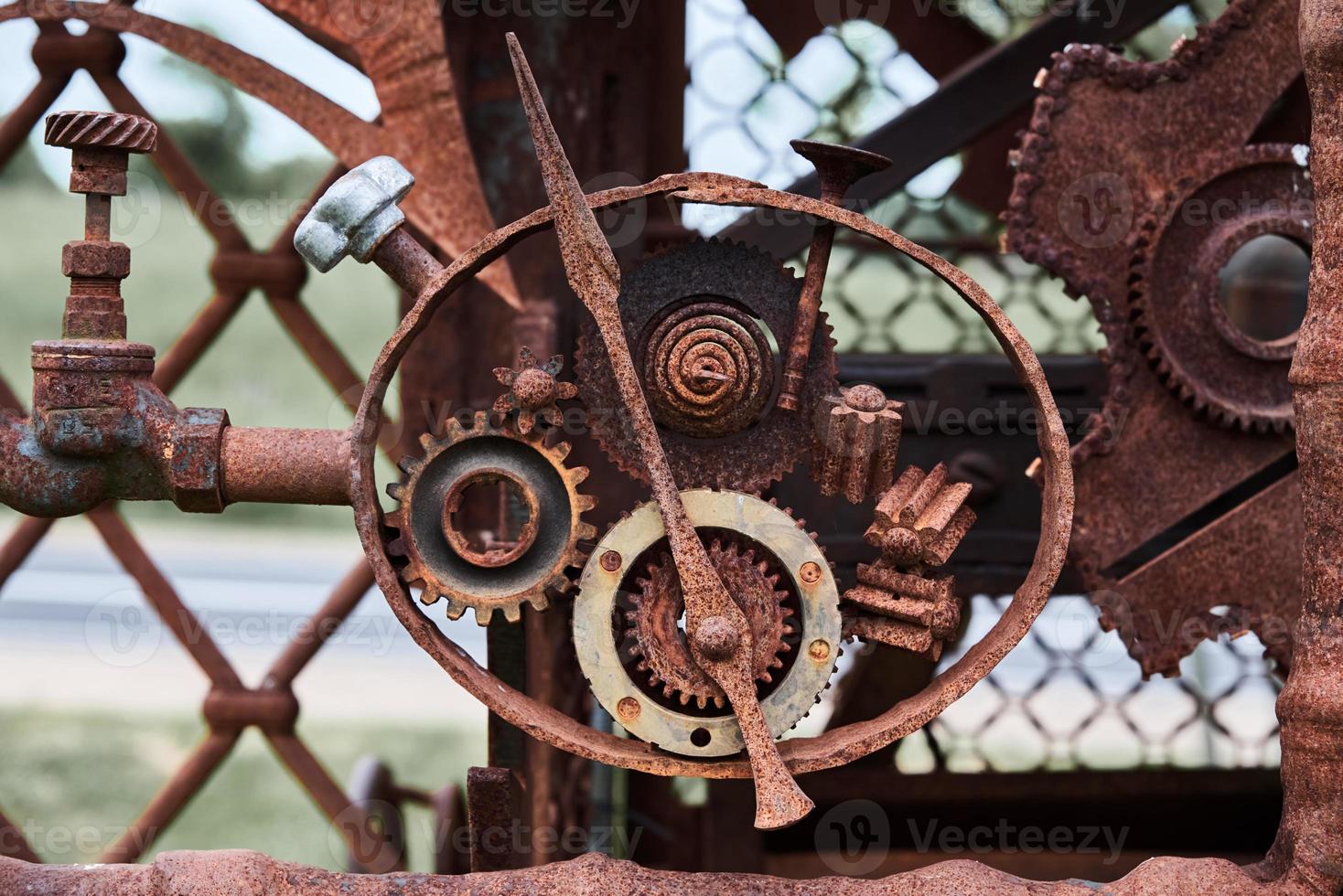 pièces mécaniques et roues dentées en fer rouillé. texture steampunk photo
