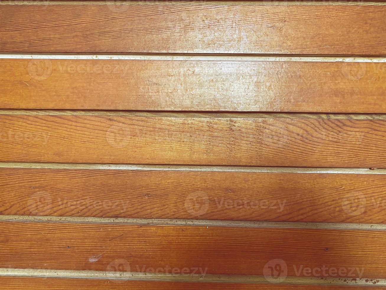 planches de bois teintées foncées avec grain et texture. fond de bois plat avec des lignes horizontales parallèles. photo