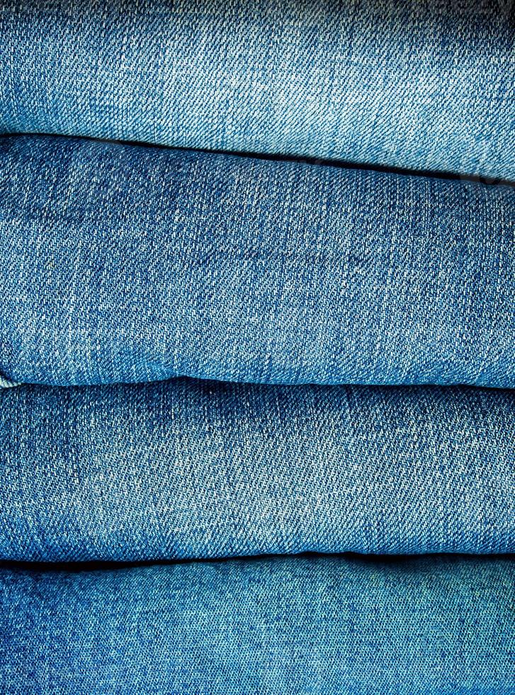 tas de jeans bleus, texture de tissu photo