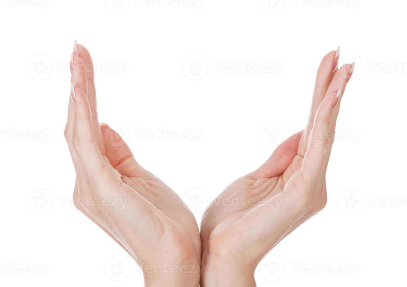 mains de femme isolées sur fond blanc photo