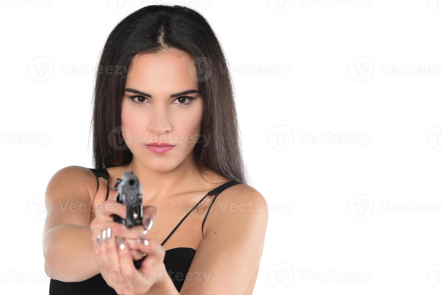 belles femmes dangereuses tenant une arme à feu photo