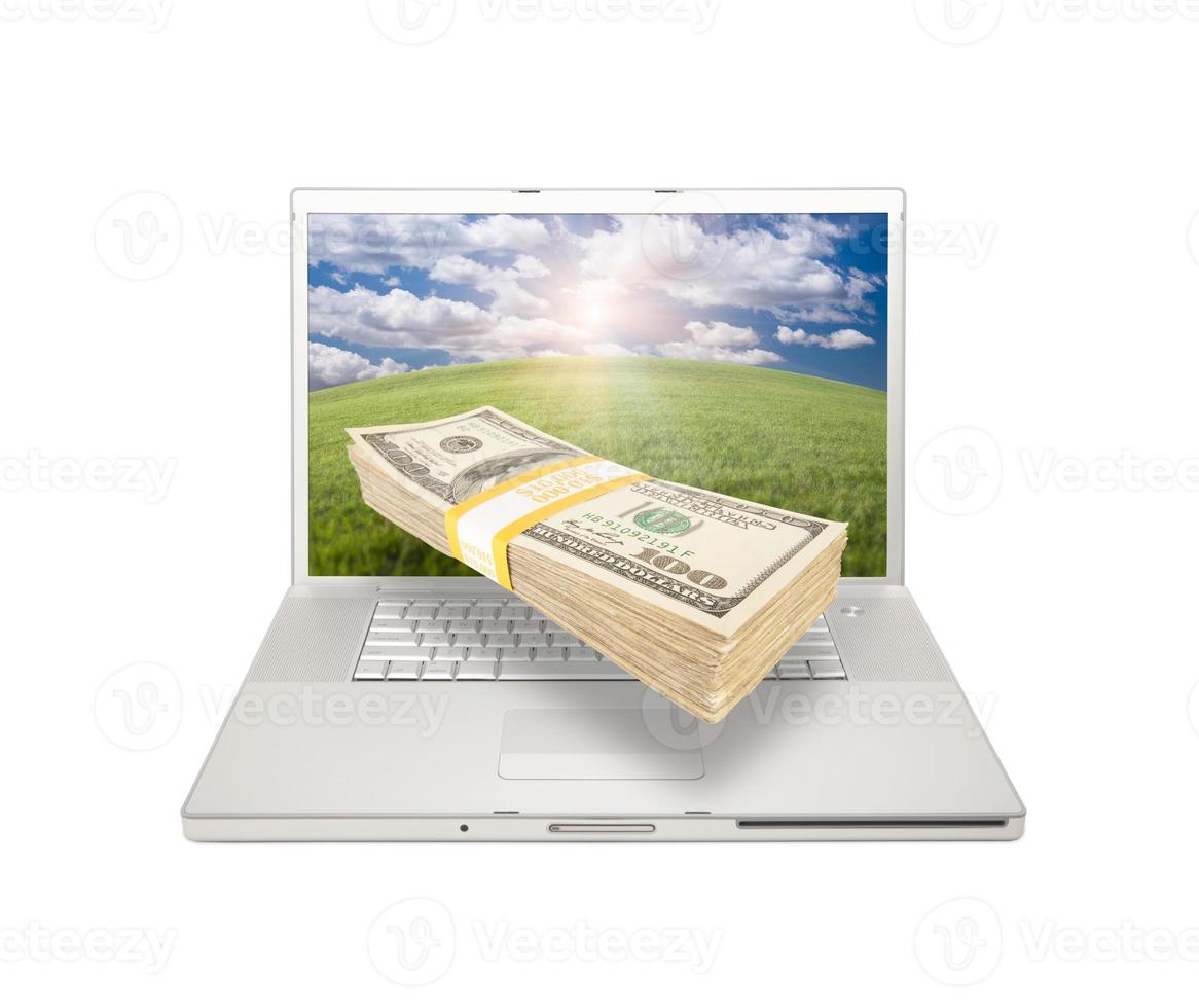 ordinateur portable avec pile d'argent provenant de l'écran photo